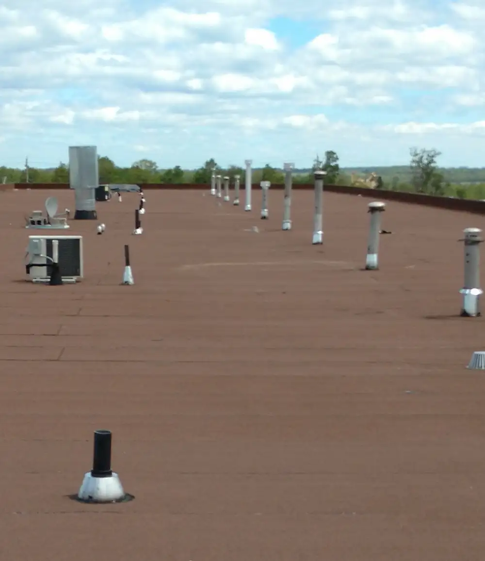 Completed modified membrane roof system with a granular cap sheet
