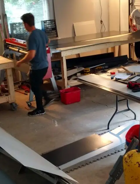 Sheet metal being formed in the Raymond Desrochers Roofing metal shop